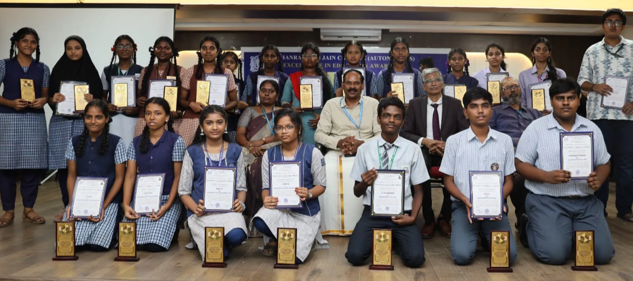 Students receiving Excellence in Education Awards 2026